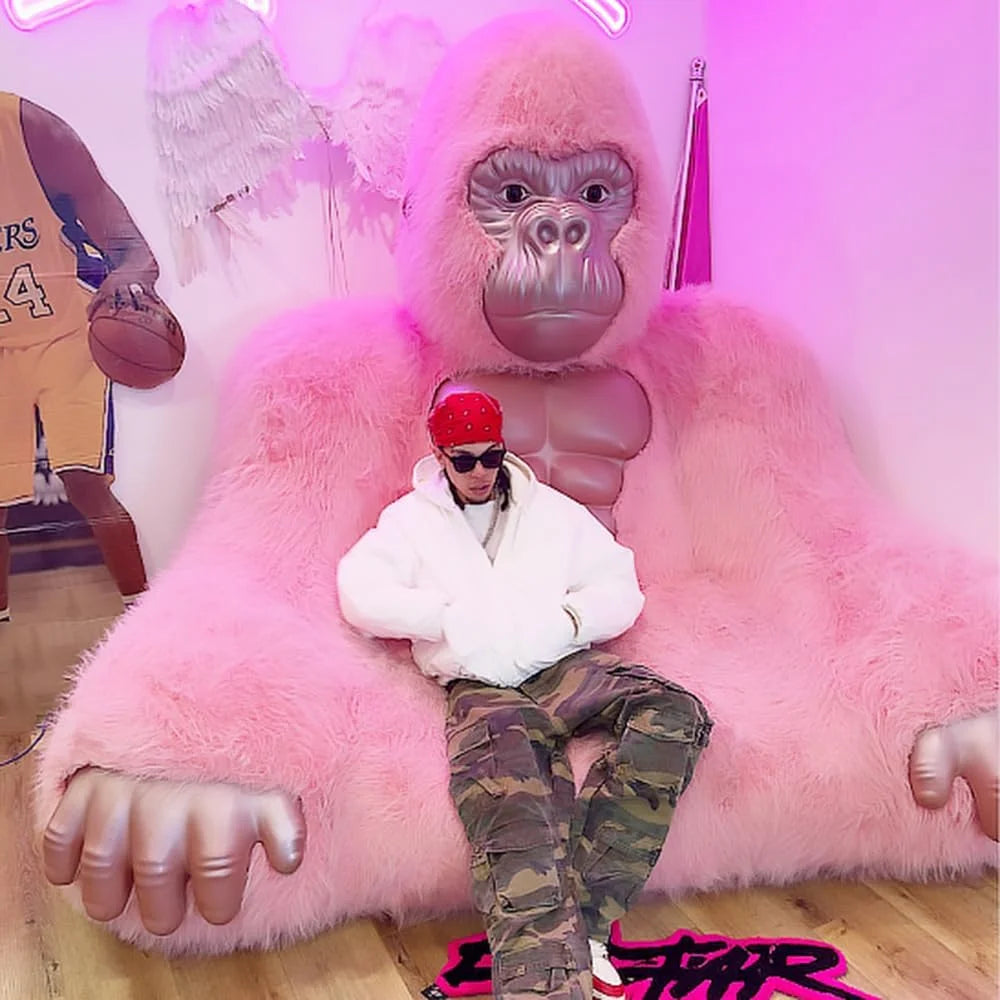 Giant Inflatable Gorilla Couch Blow Up Gorilla Sofa Furry Plush Orangutan Furniture for Lounging, Gaming or Movie Nights (Pink)