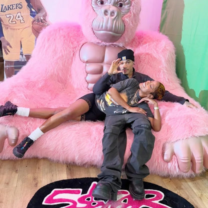 Giant Inflatable Gorilla Couch Blow Up Gorilla Sofa Furry Plush Orangutan Furniture for Lounging, Gaming or Movie Nights (Pink)
